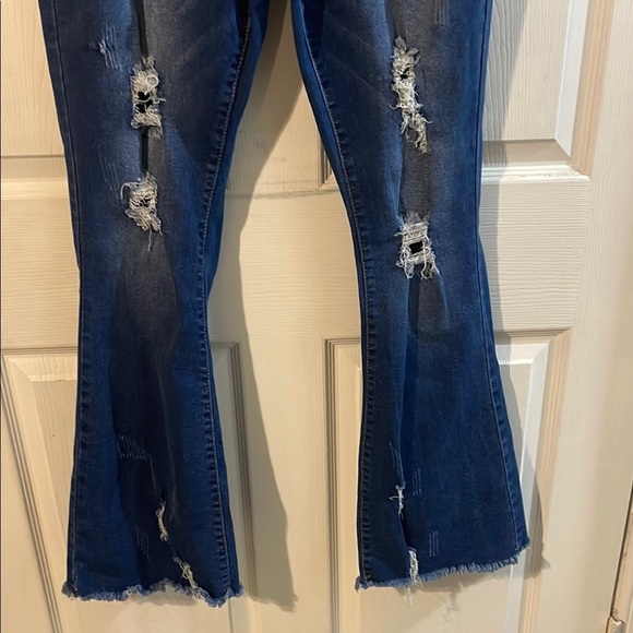 Chic Distressed Flare Jeans in Deep Blue - Picture 3 of 11